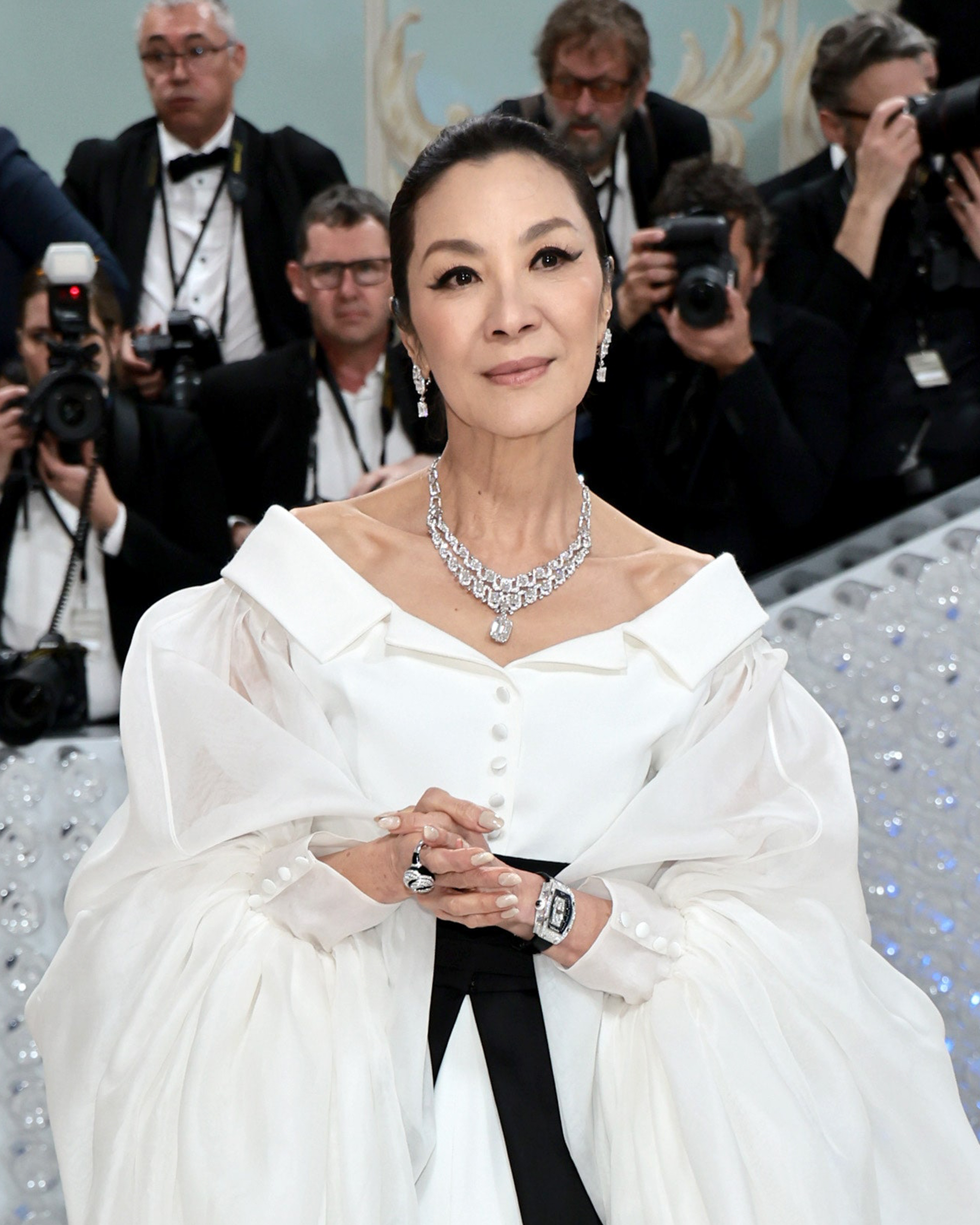Michelle Yeoh wearing the Cartier [Sur]naturel High Jewelry necklace, and earrings in the Met Gala 2023