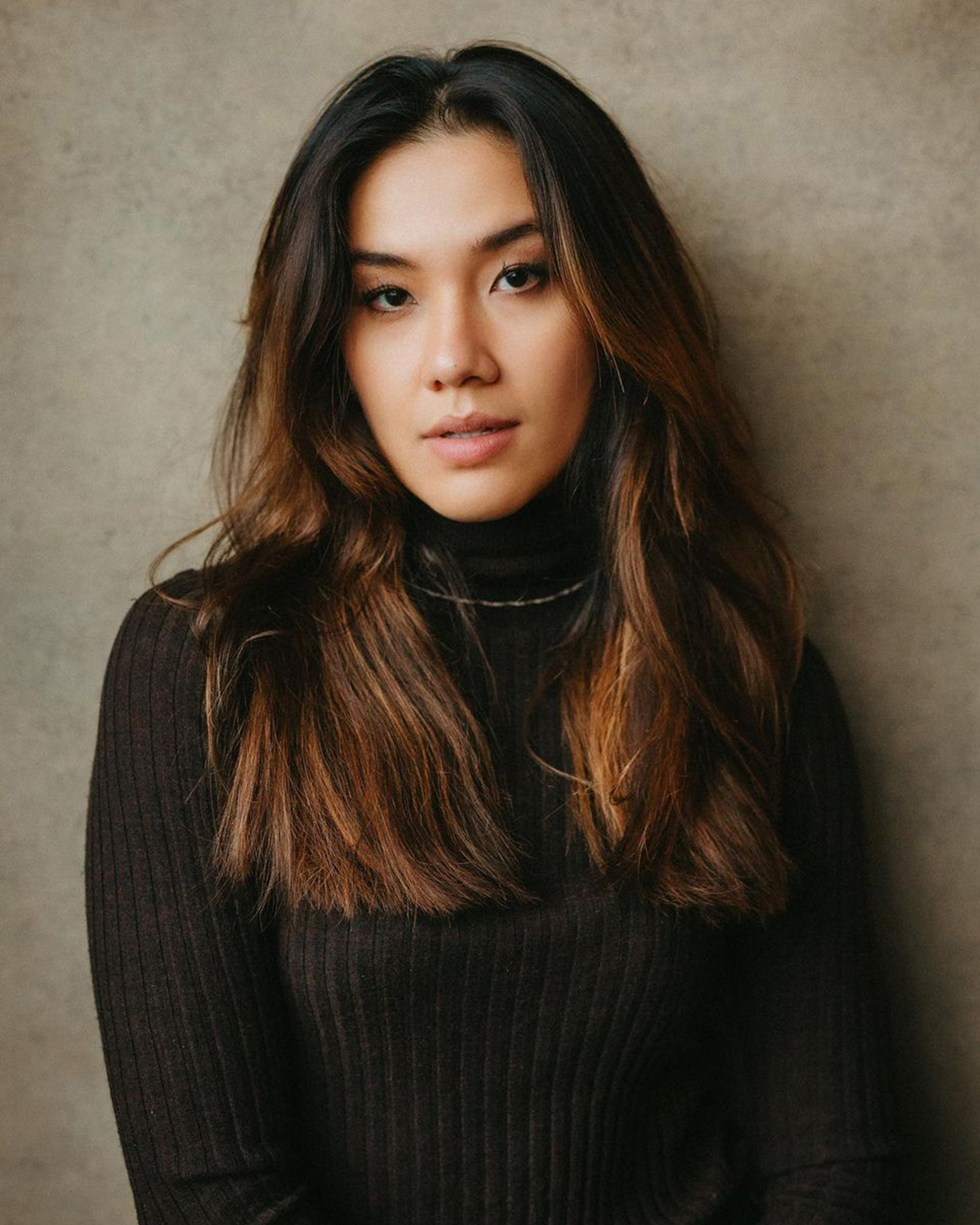 Portrait of Julia Saubier wearing black turtle neck