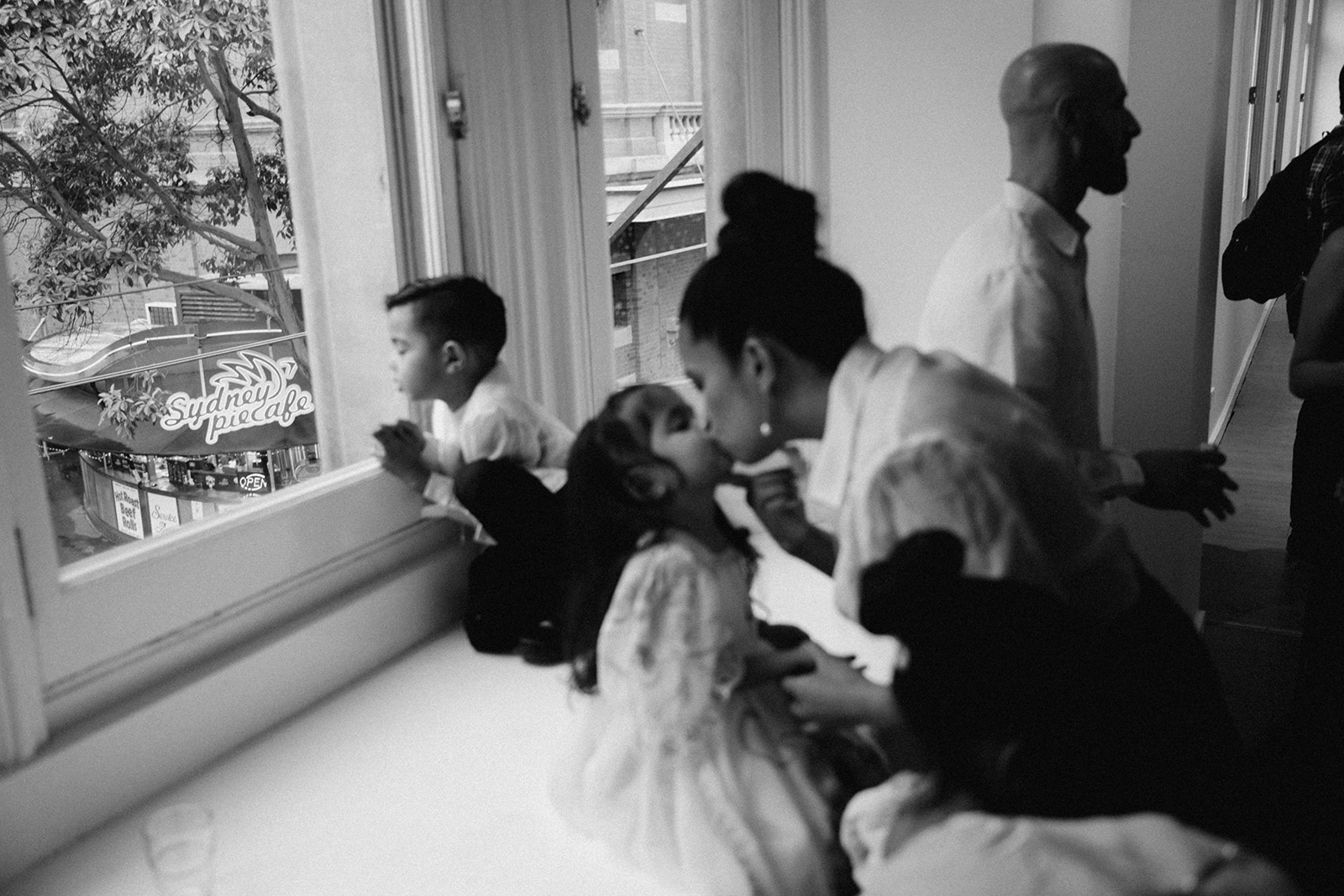 Marikit Santiago and her family at a solo painting exhibition opening