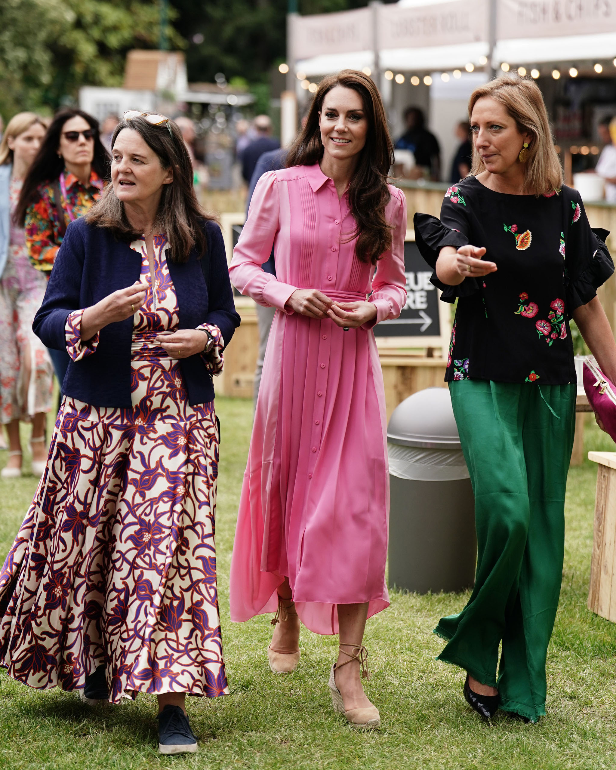 Kate Middleton in a pink button dress