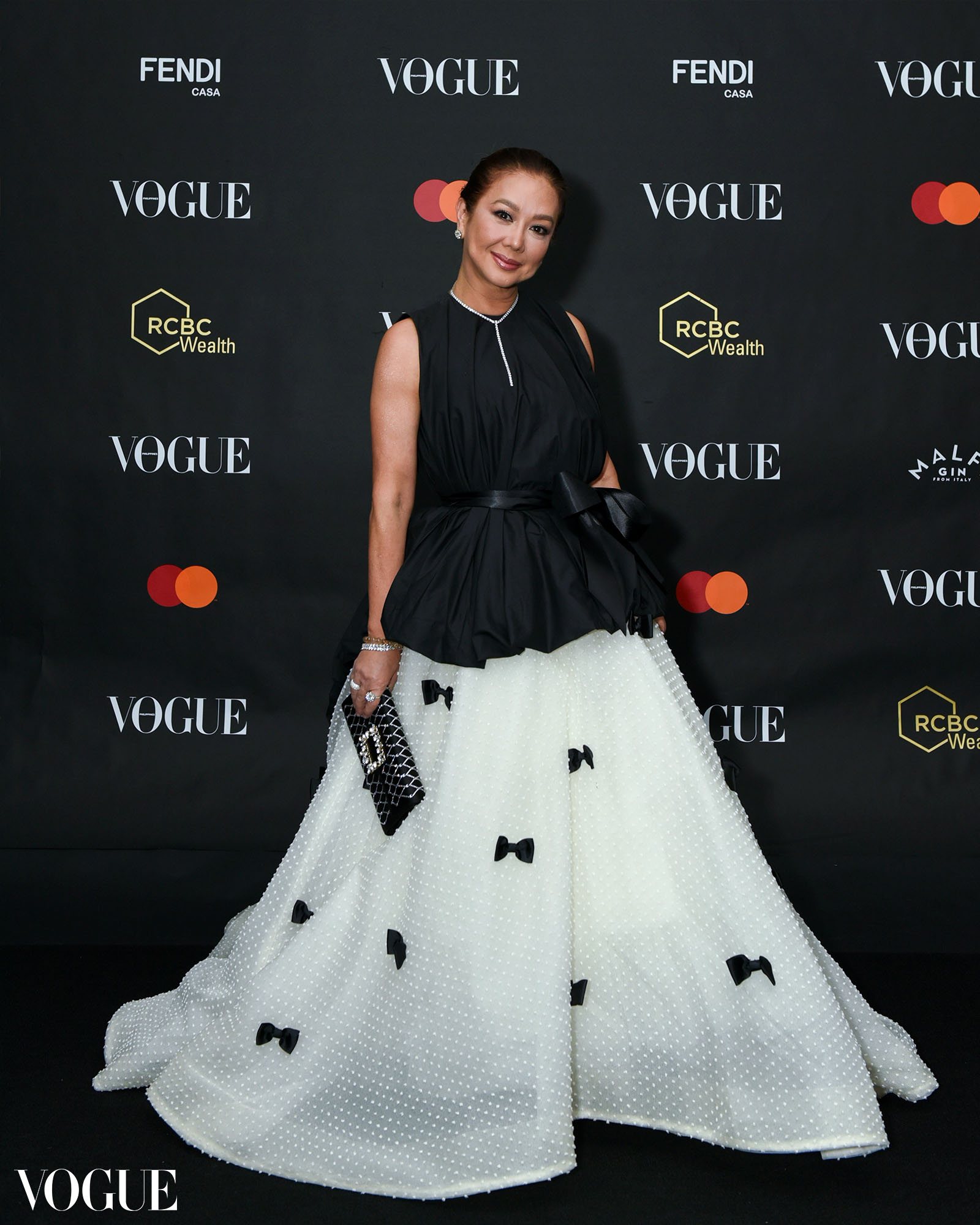 Korina Sanchez posing at the photo wall at the Vogue Philippines Gala 2023