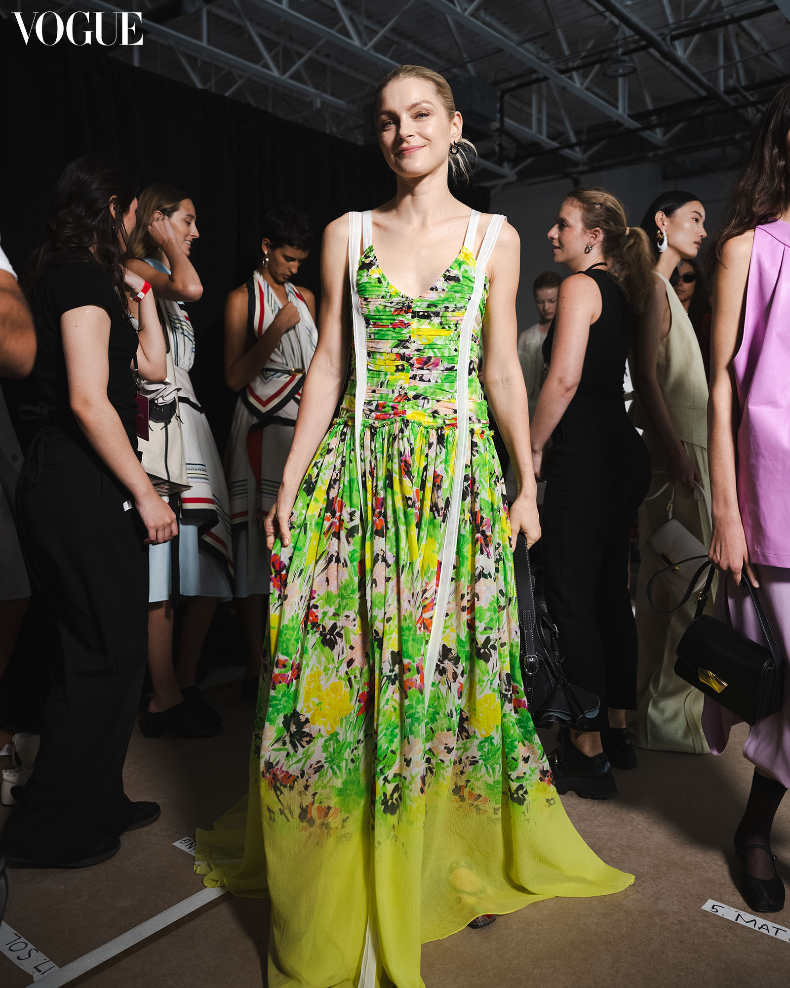 Girl in green dress by Phillip Lim