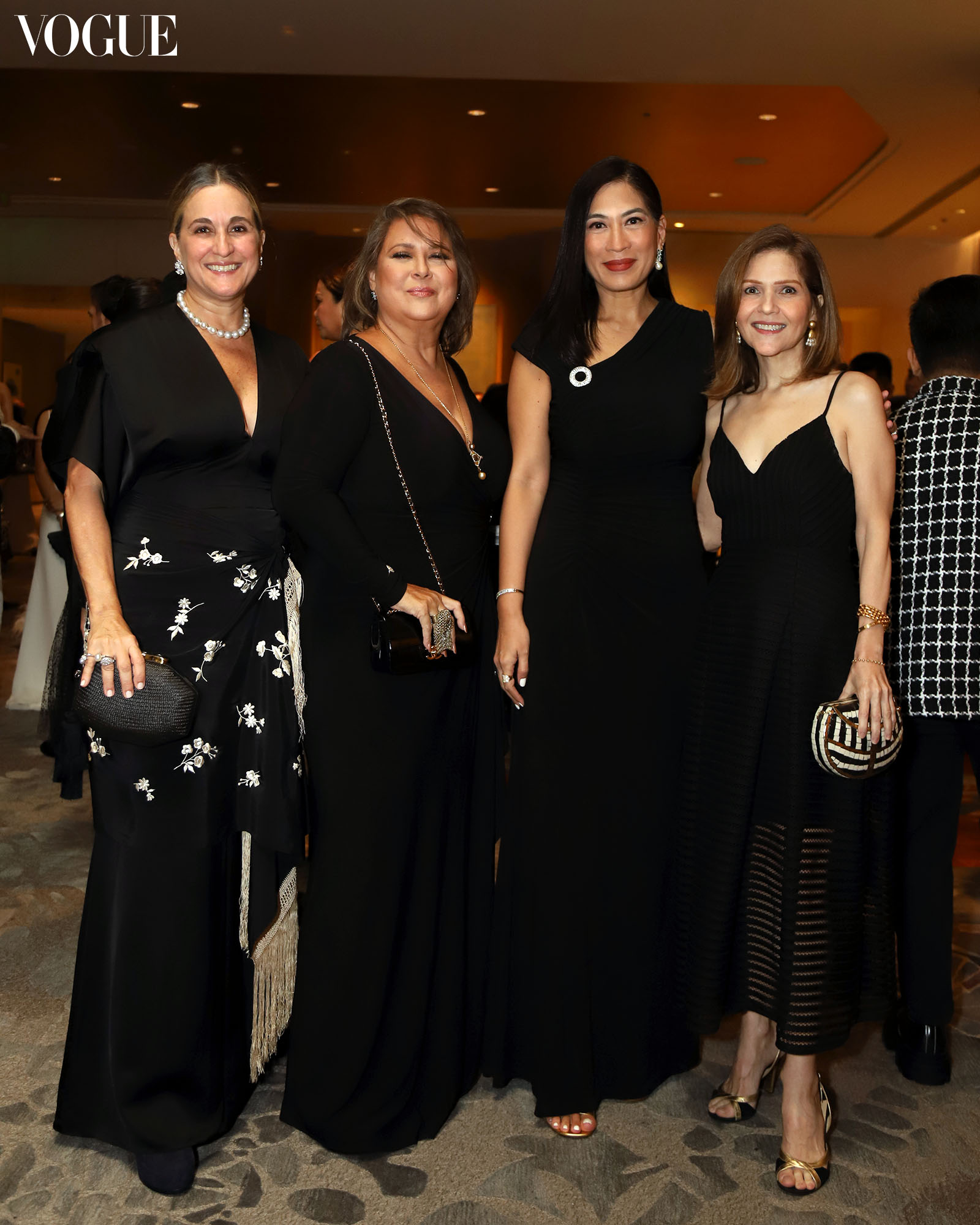 Sofia Elizalde Junie Peña Techie Hagedorn and Anne Marie Saguil posing at the photo wall at the Vogue Philippines Gala 2023