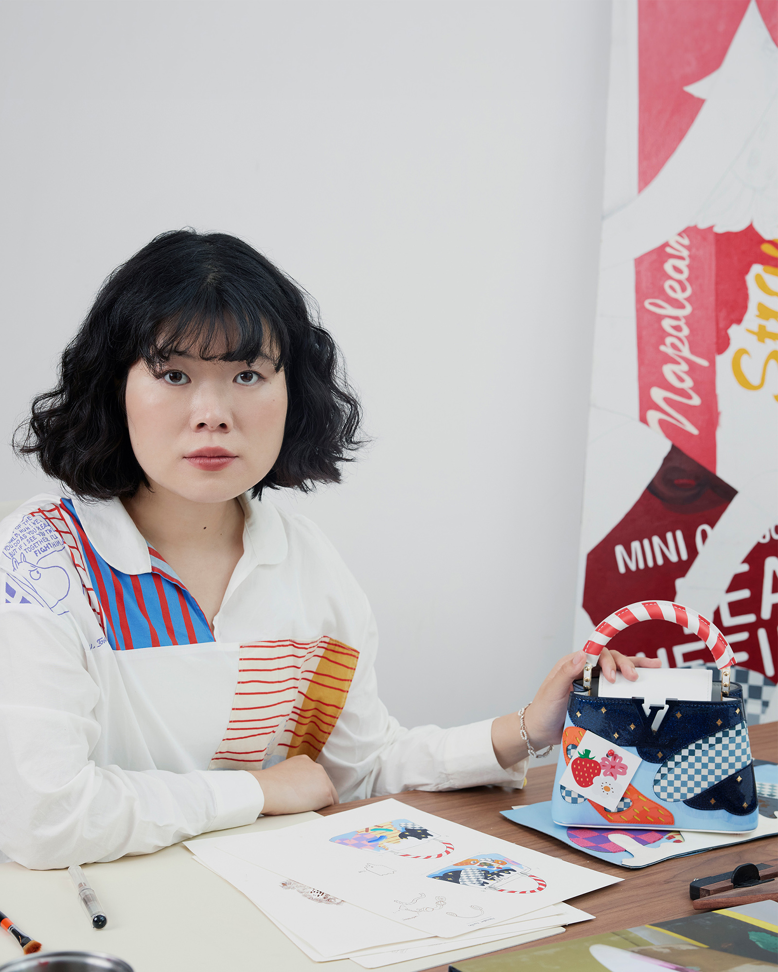 Artist Ziping Wang posing with her ‘Sweet Tooth’ Artycapucines.