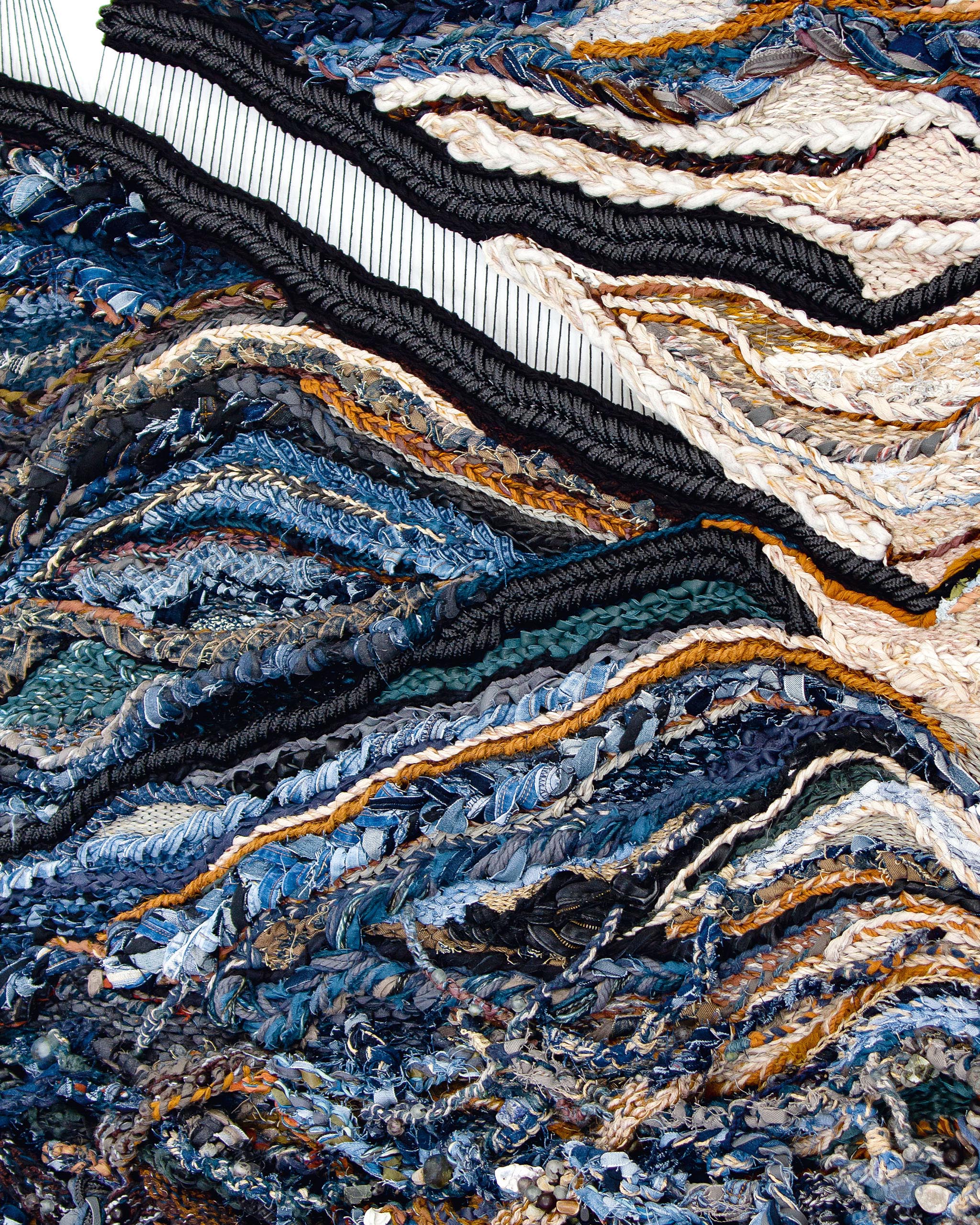 blue woven pattern of threads