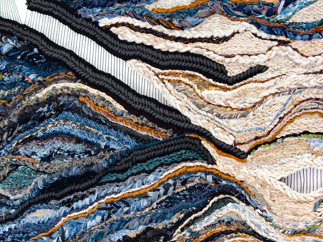 blue woven pattern of threads