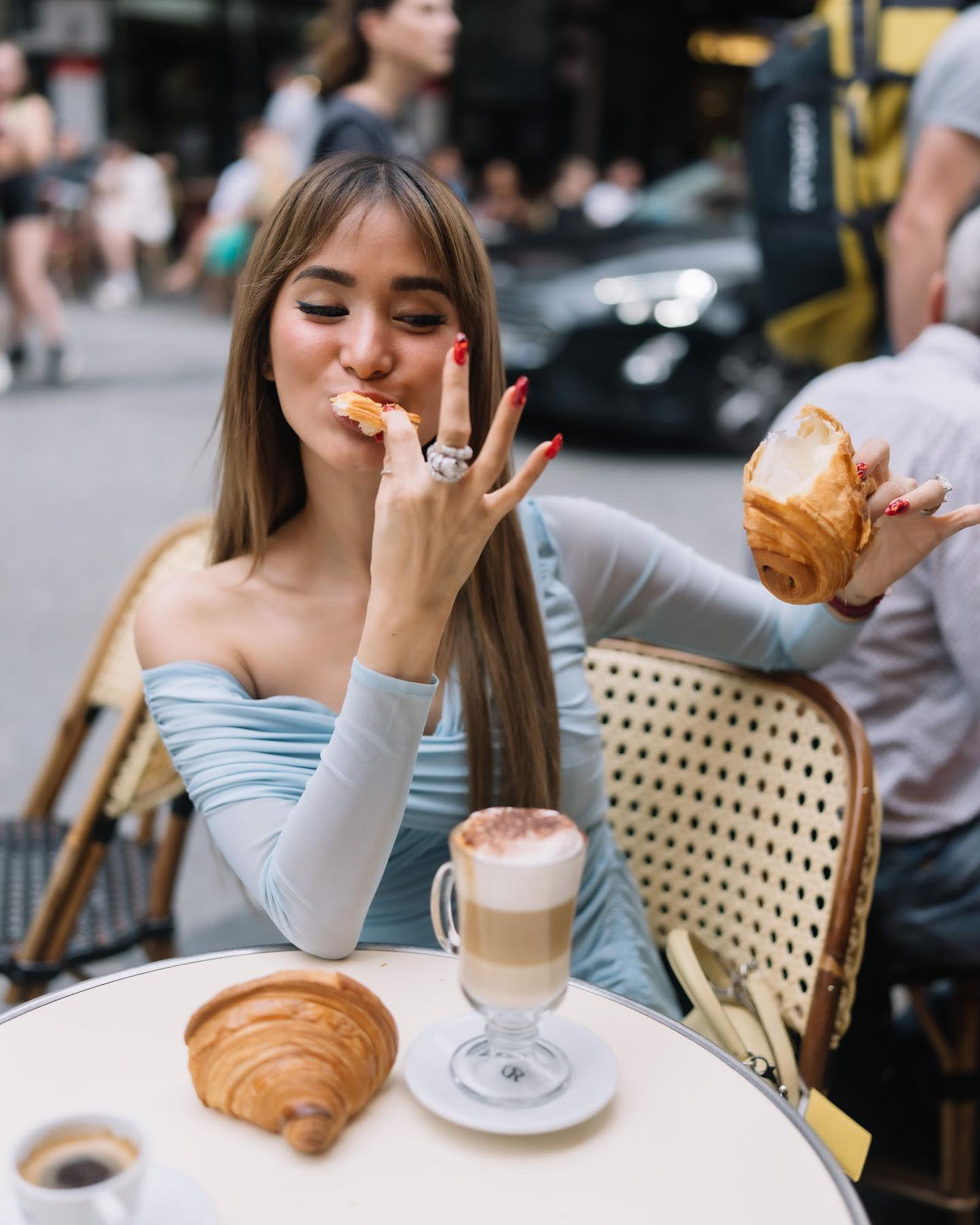 Heart Evangelista enjoys a croissant from Stohrer.