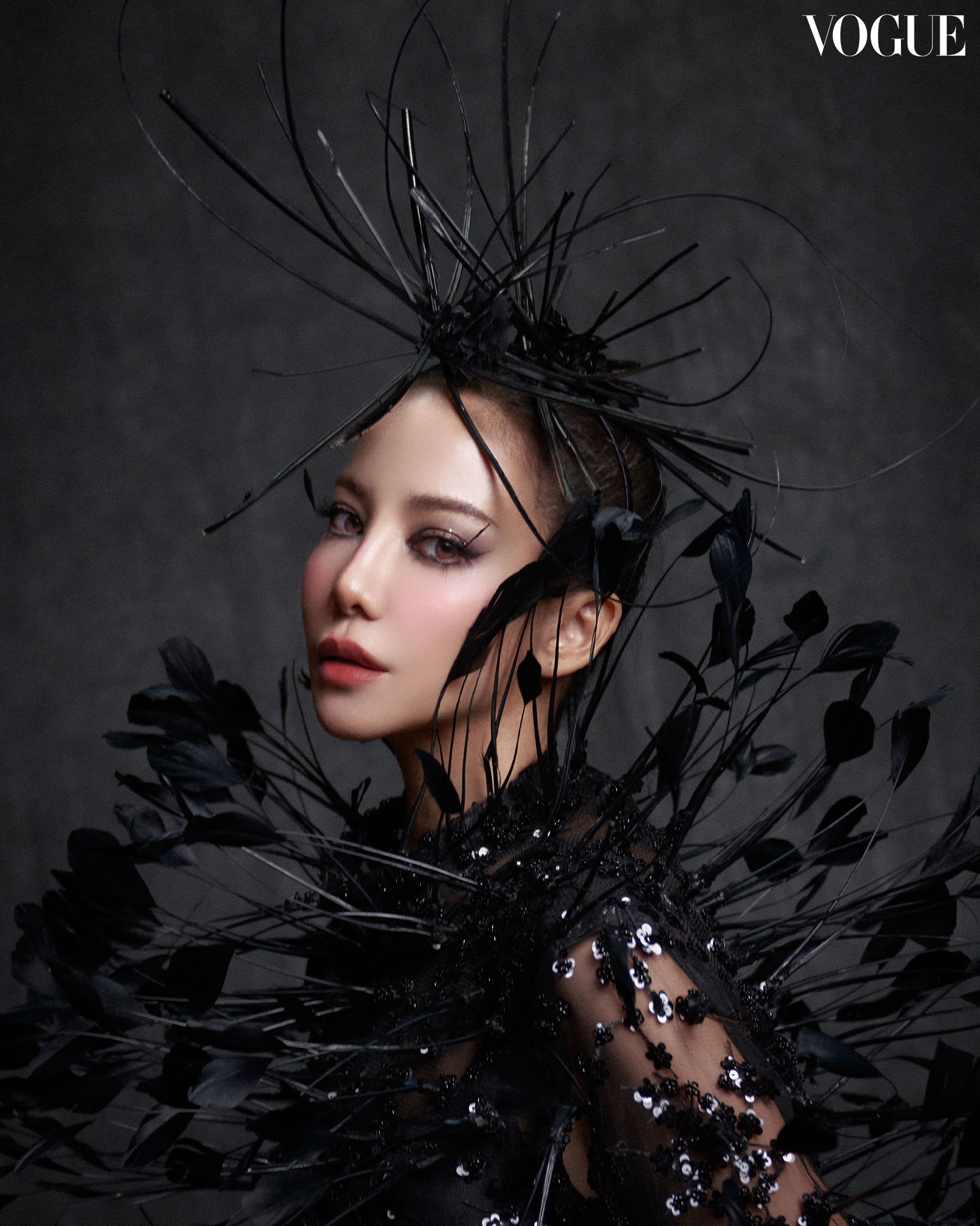Black architectural headdress.