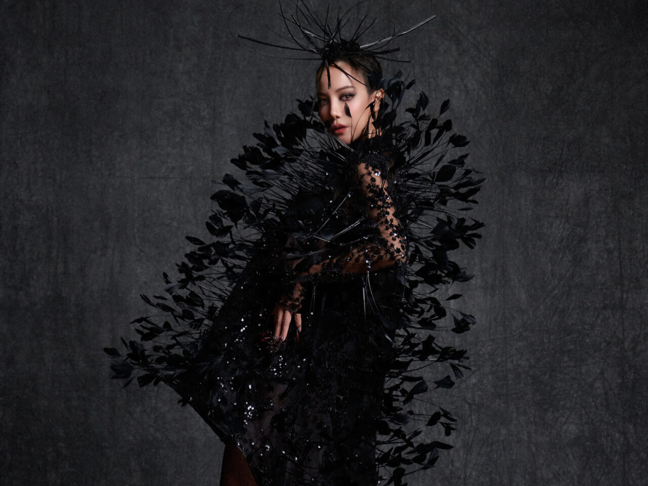 Black feathered dress.