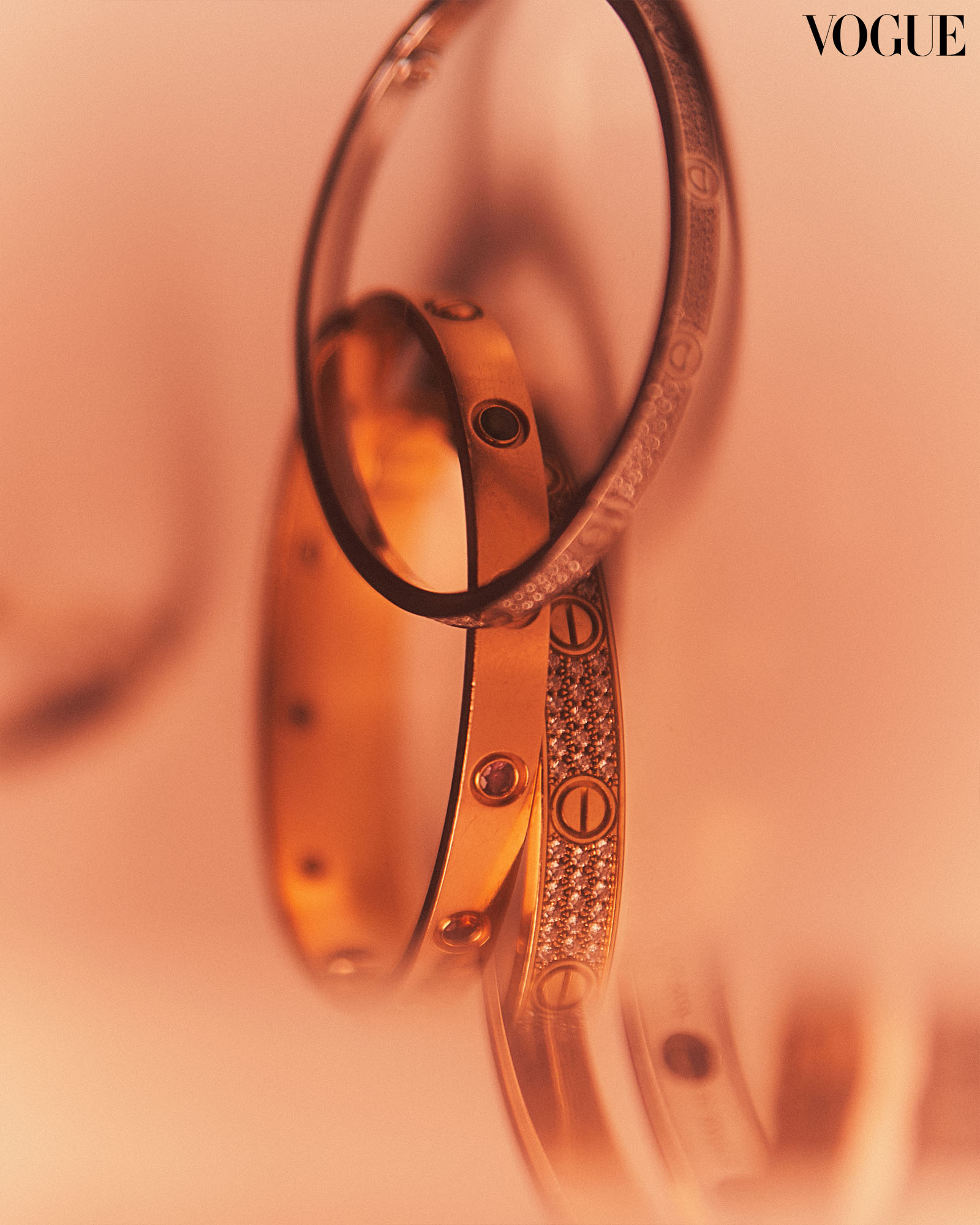 Details of Heart Evangelista’s Cartier LOVE bracelets.