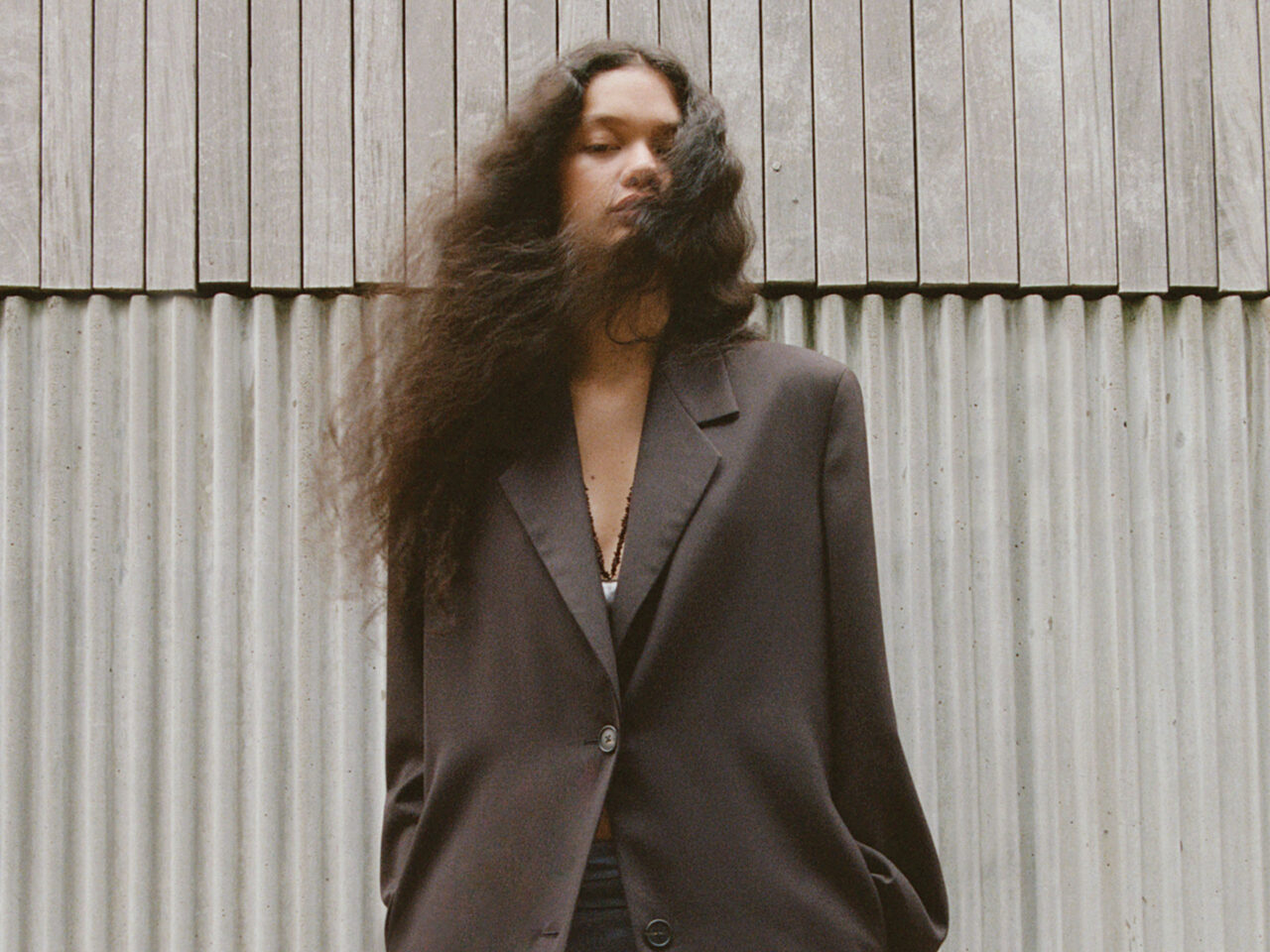 Maddux Callaway wearing a trench coat, photographed by Sophia Aerts.