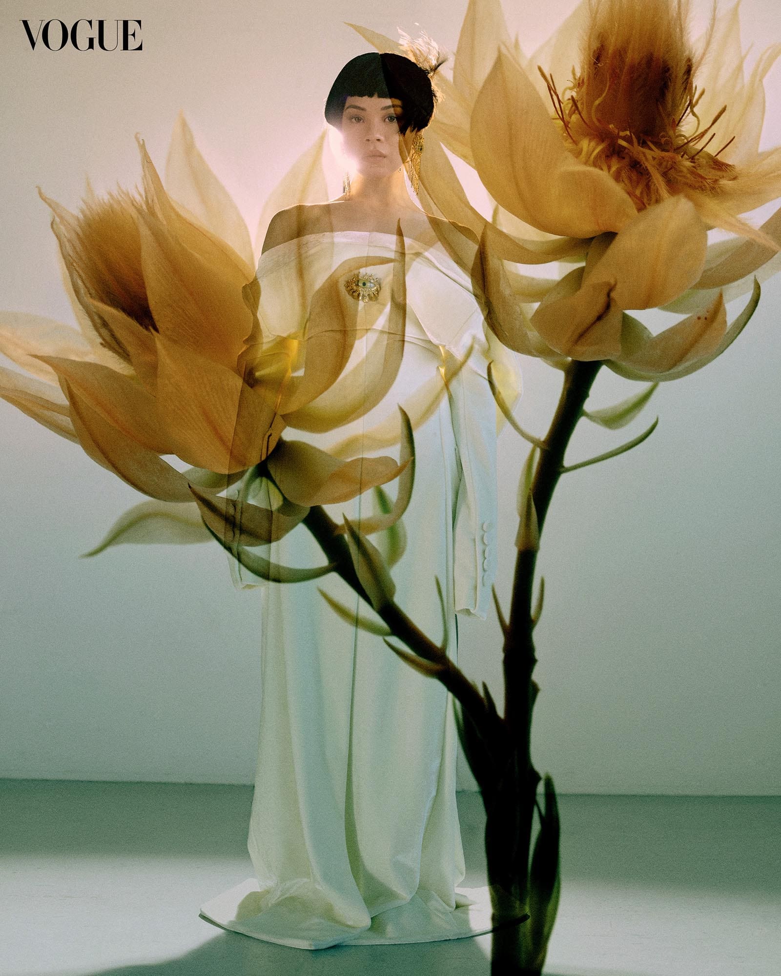 Broadway Eva Noblezada Vogue Philippines cover flowers Schiaparelli coat and earrings