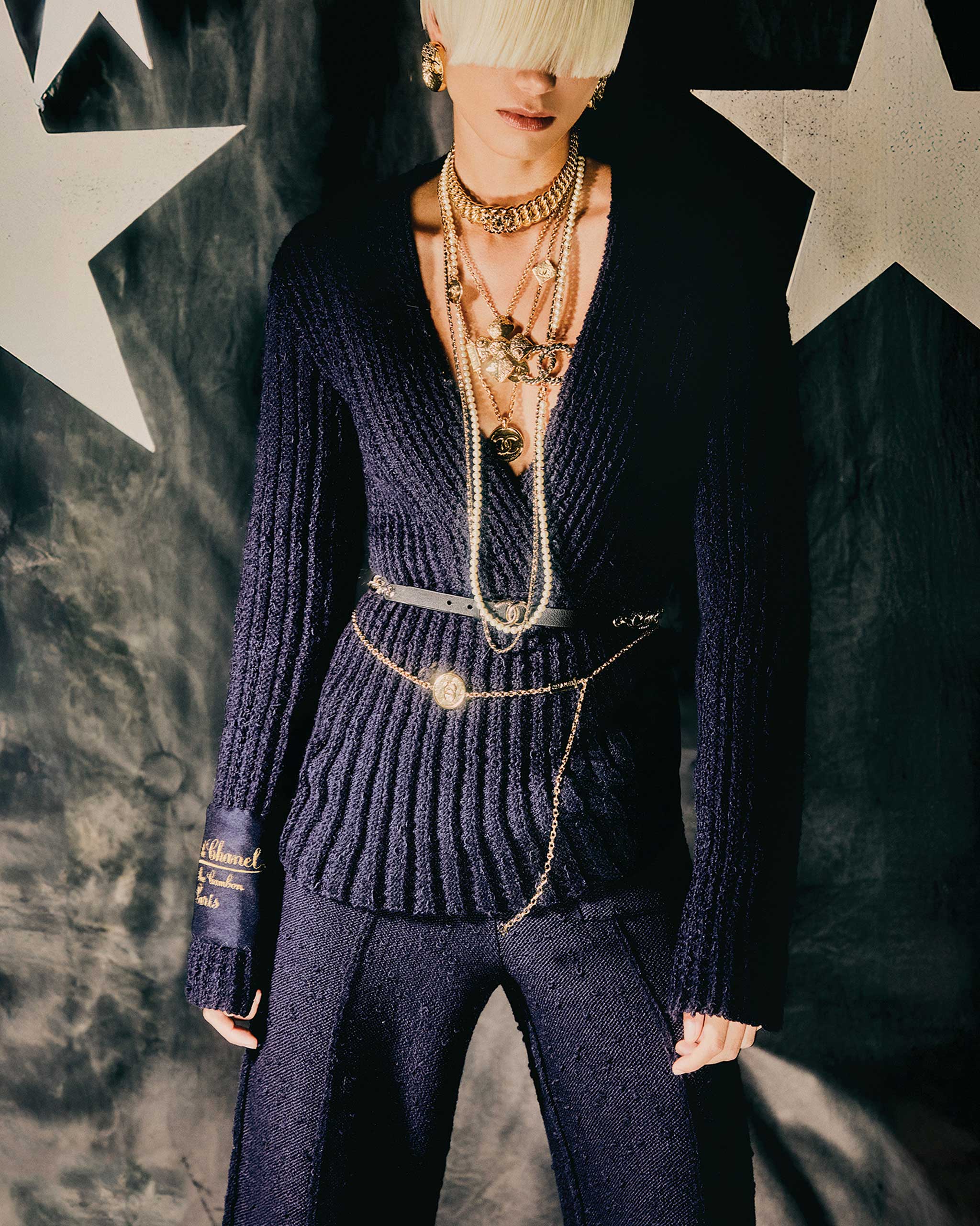 astrology for 2025 vogue philippines model in a navy blue chanel top and trousers with stars