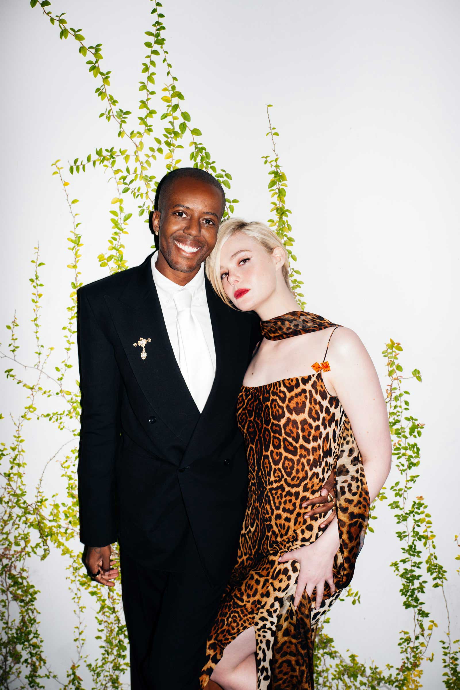 A photo of Vas J. Morgan and Elle Fanning.