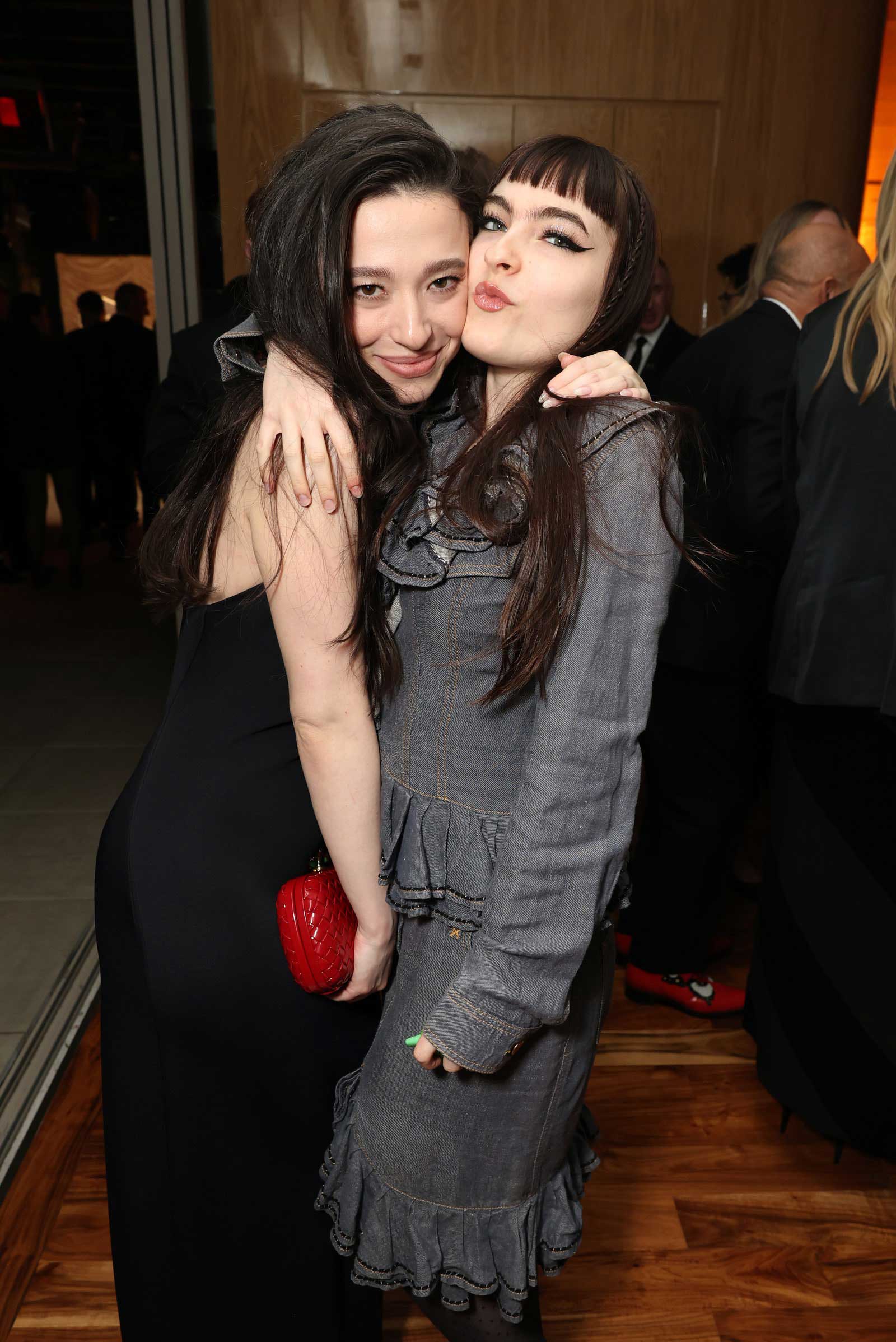 Anora's Mikey Madison and Ivy Wolk pose for a photo.