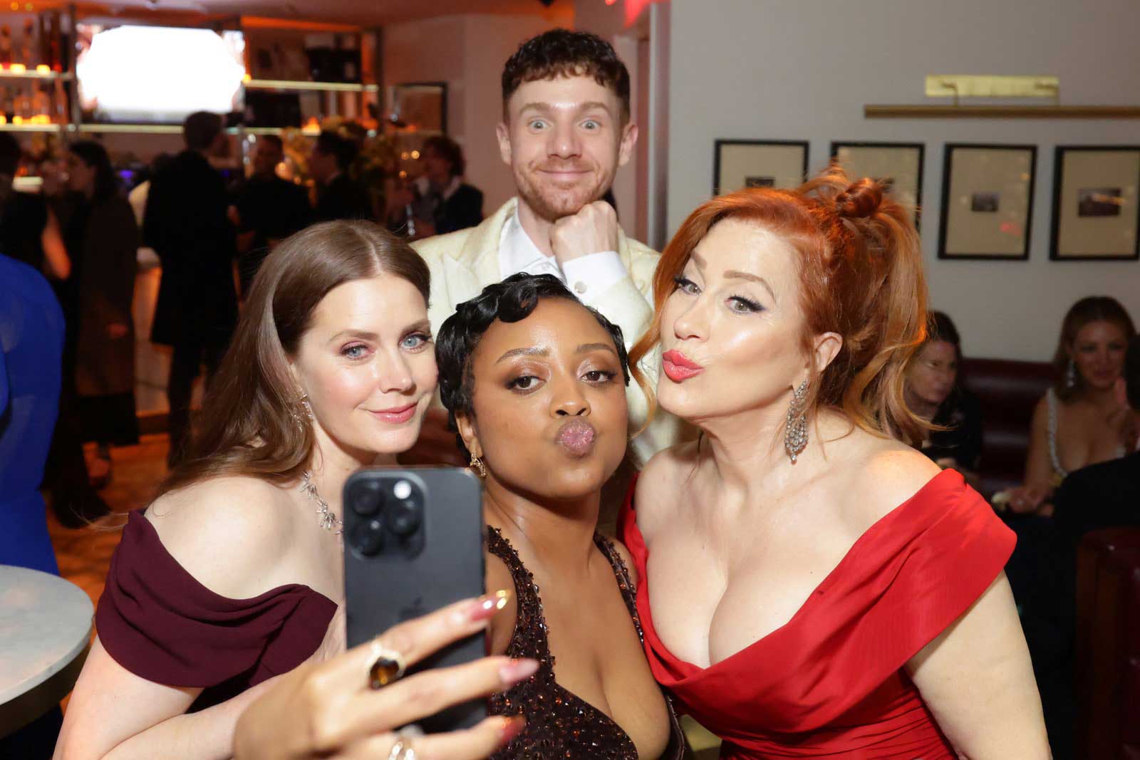 A photo of Amy Adams, Quinta Brunson, Chris Perfetti and Lisa Ann Walter taking a selfie.