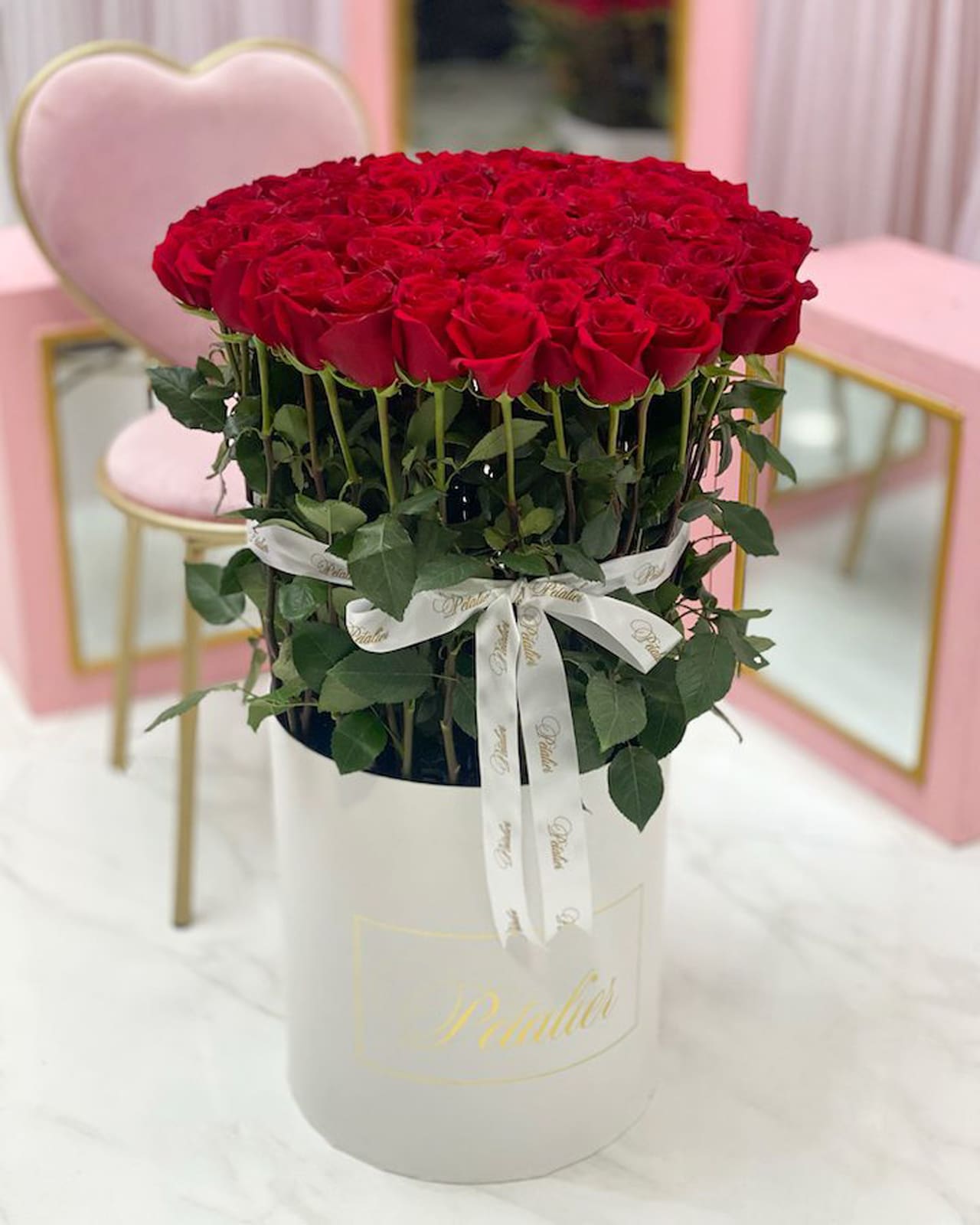 A bouquet of long-stemmed Ecuadorian red roses