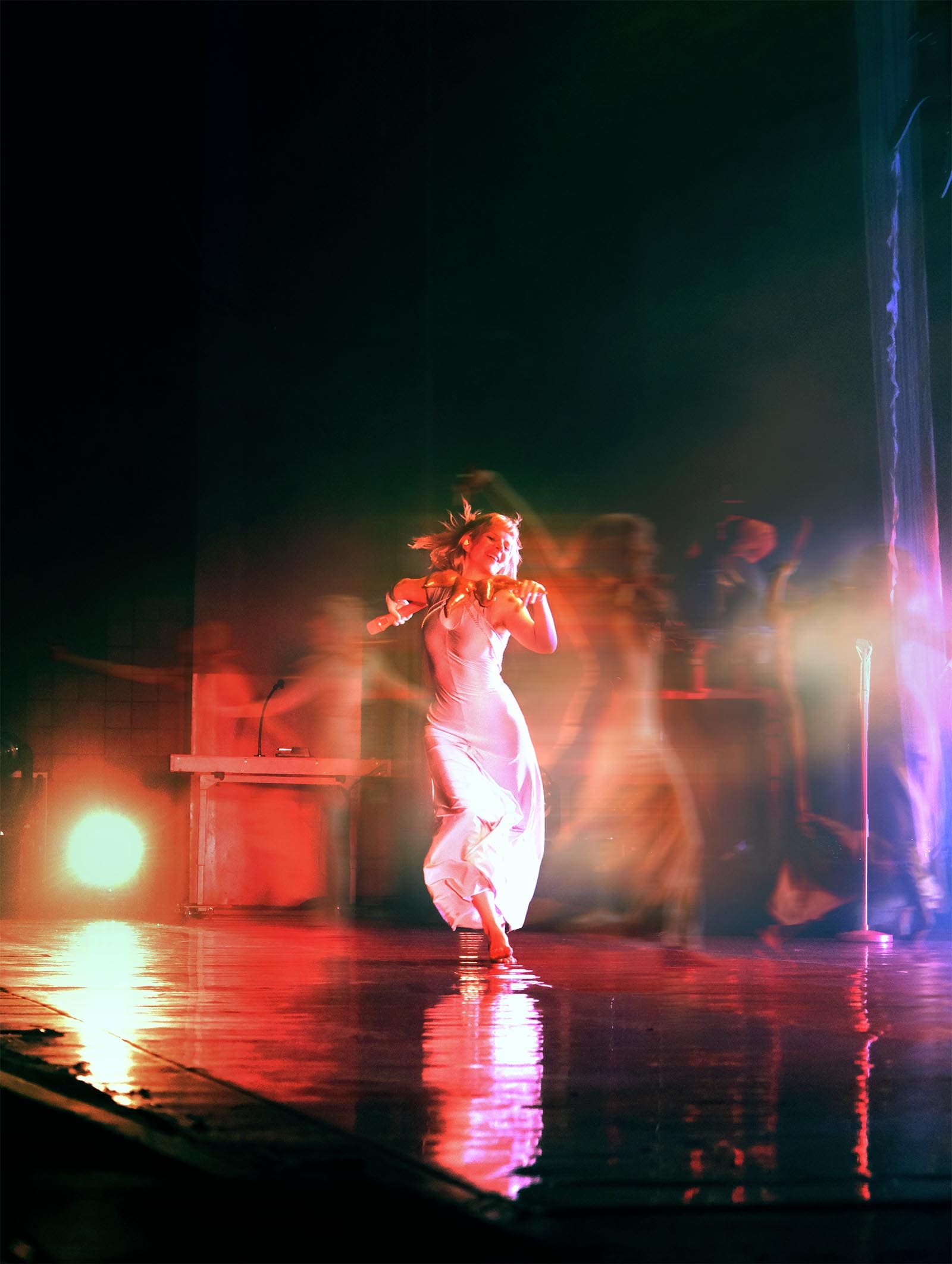 Musician Aurora performing on stage.