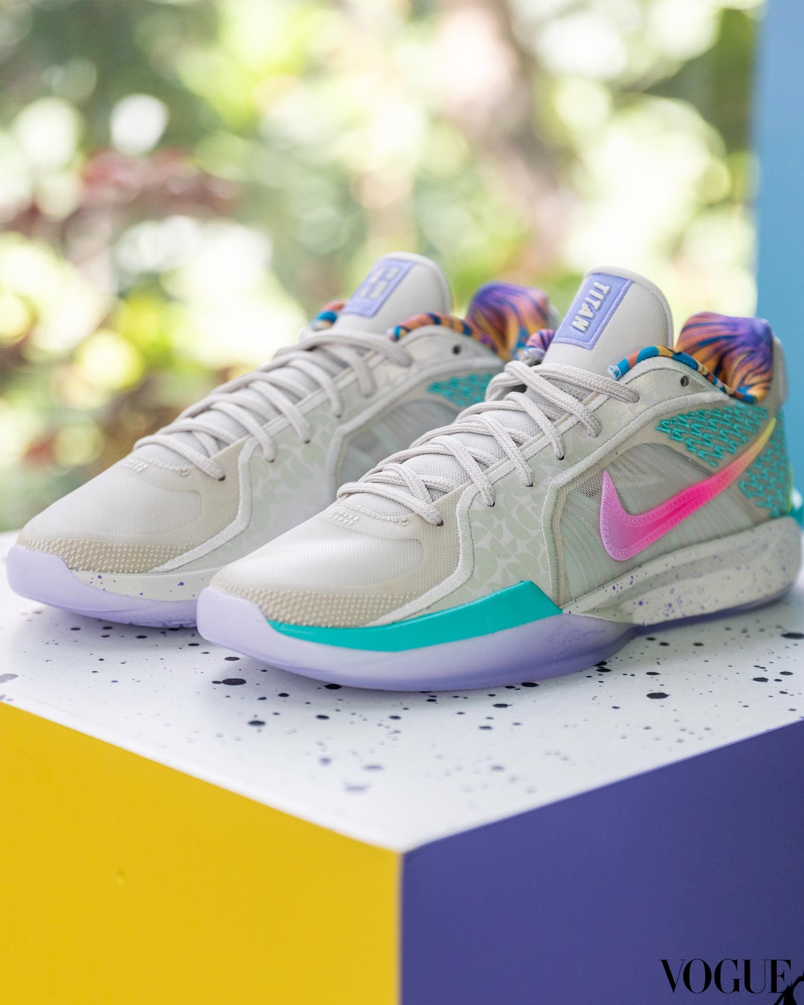The limited-edition Sabrina 2 EP x TITAN shoes featuring shades of purple, teal, and pink.