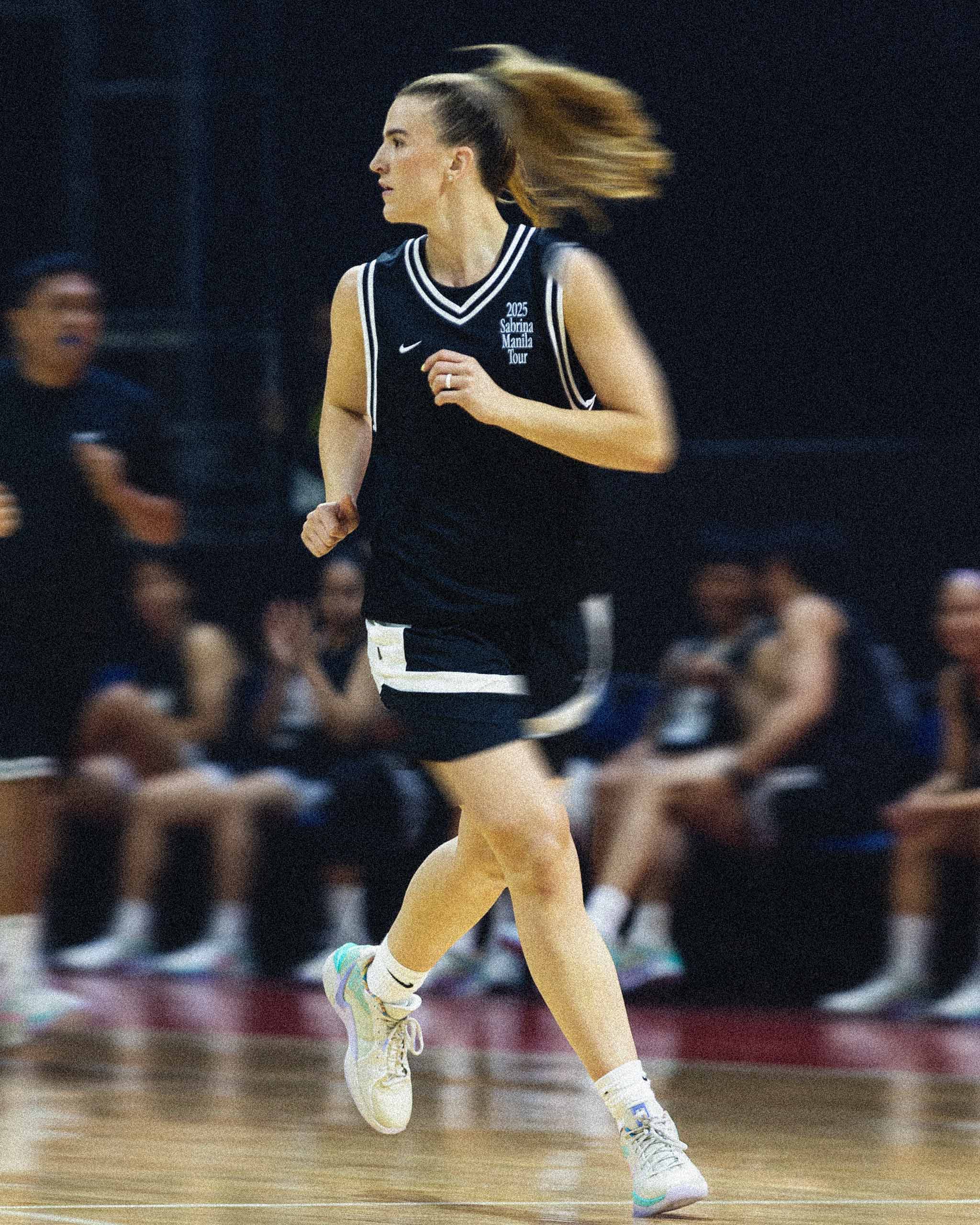 Sabrina Ionescu wearing a black 2025 Sabrina Manila Tour jersey at SMART Araneta Coliseum