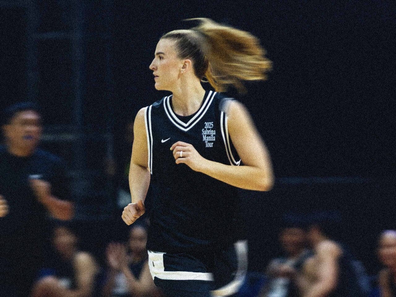 Sabrina Ionescu wearing a black 2025 Sabrina Manila Tour jersey at SMART Araneta Coliseum