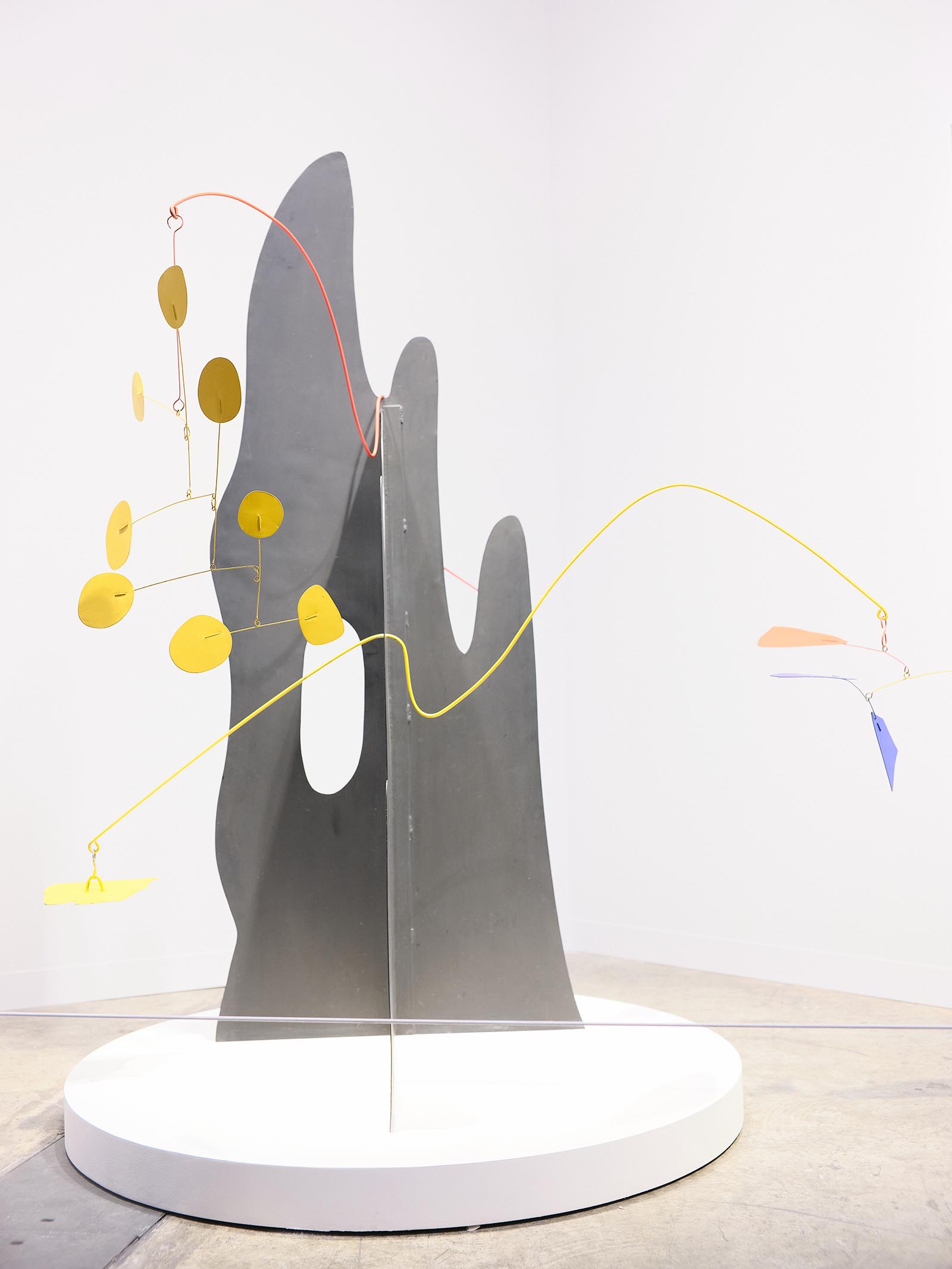 Installation artwork with abstract panels and wires.