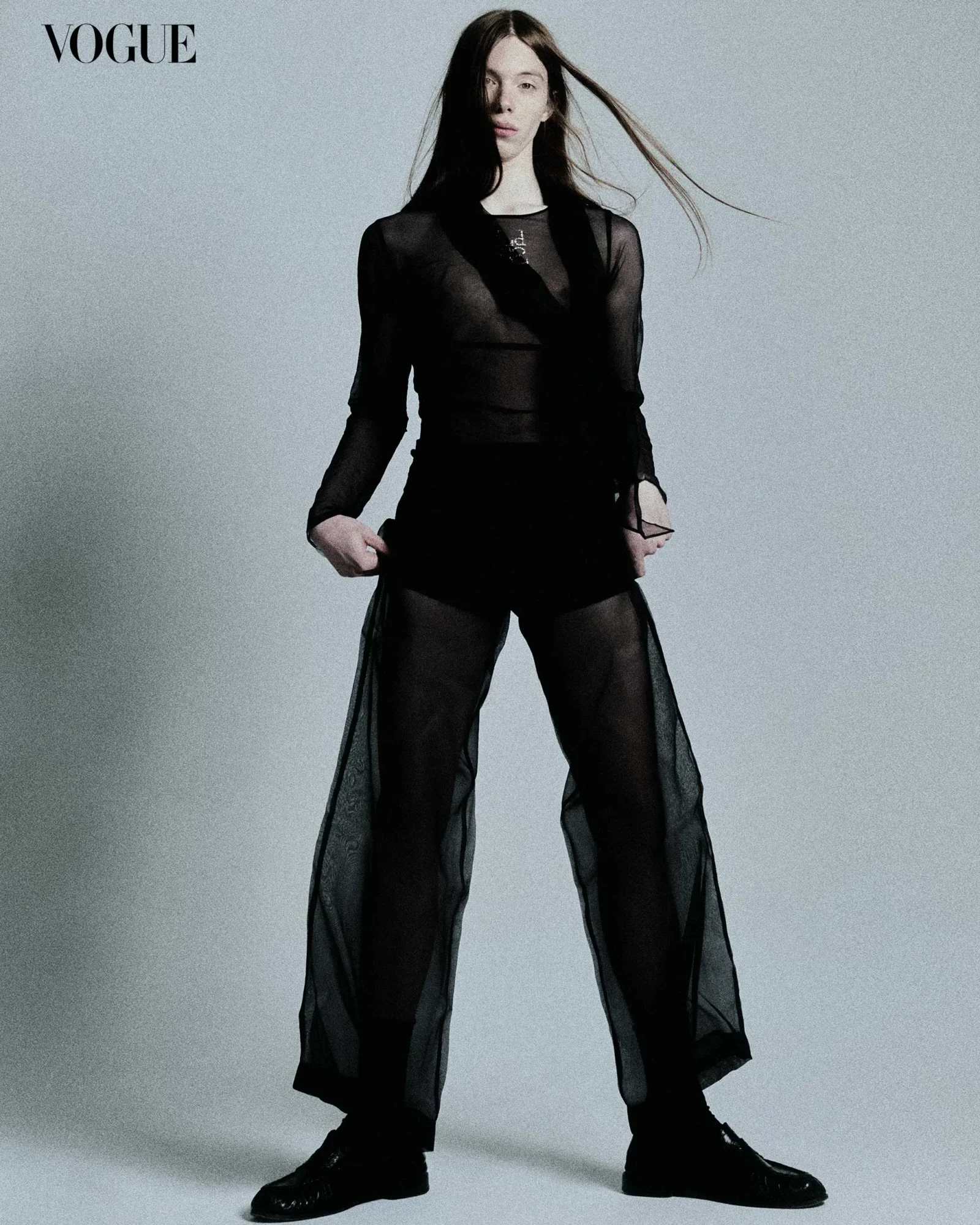 Gianni wears a Ludovic de Saint Sernin top, Zing scarf and silk pants, Tom Ford underwear and socks, Saint Laurent shoes