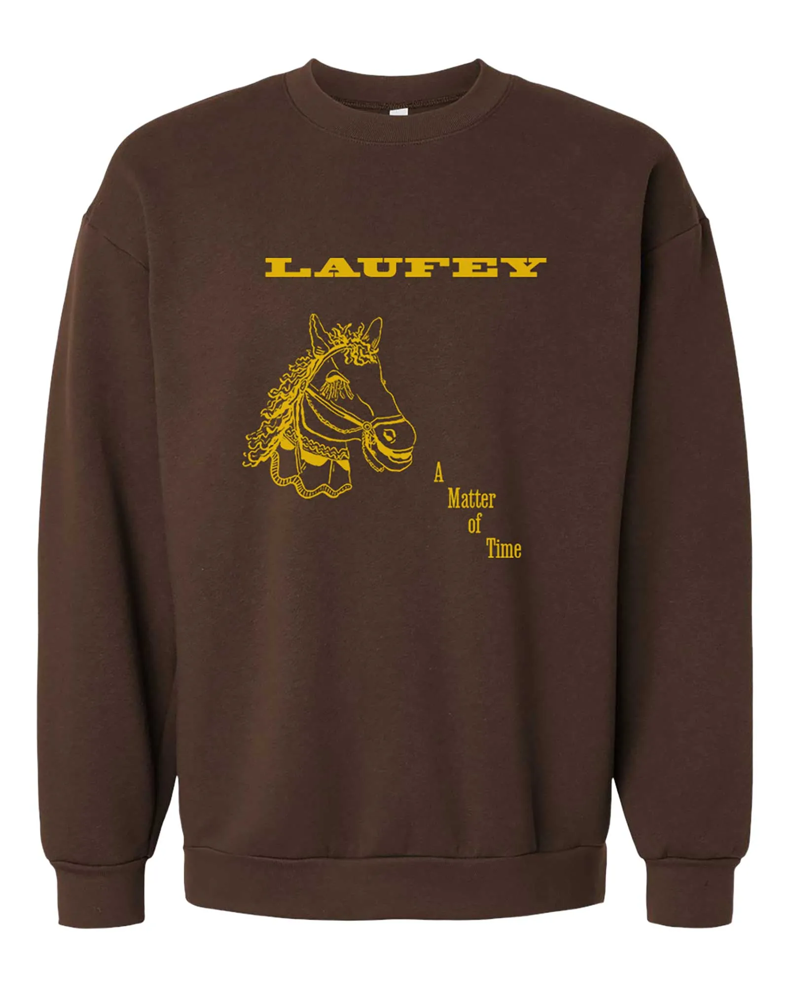 Brown crewneck sweatshirt featuring yellow typography and a yellow horse illustration on the front, with the phrase 'A Matter of Time' partially visible.