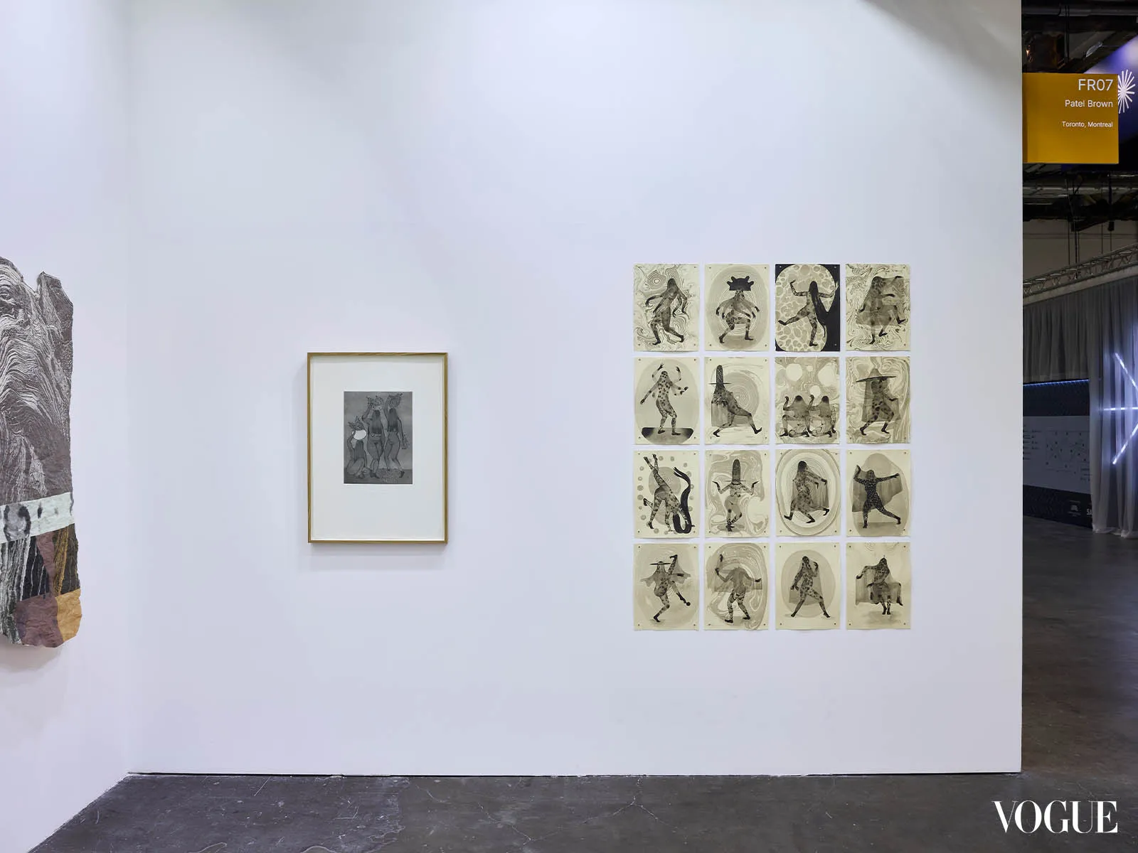 White gallery wall with a framed grayscale artwork on the left and a 15-piece grid of monochrome prints on the right; Vogue logo appears at the bottom right.