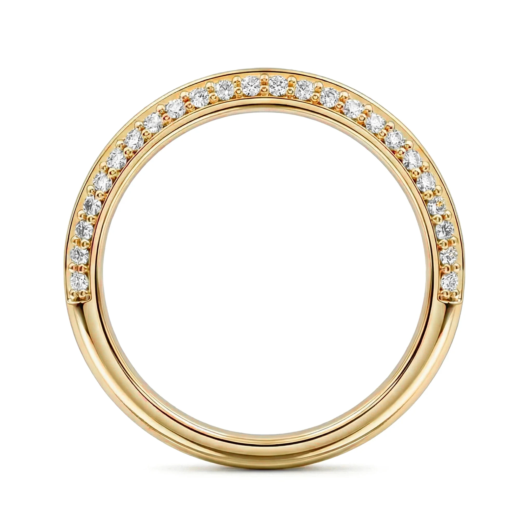Close-up of a gold ring band set with a line of diamonds along the curved edge
