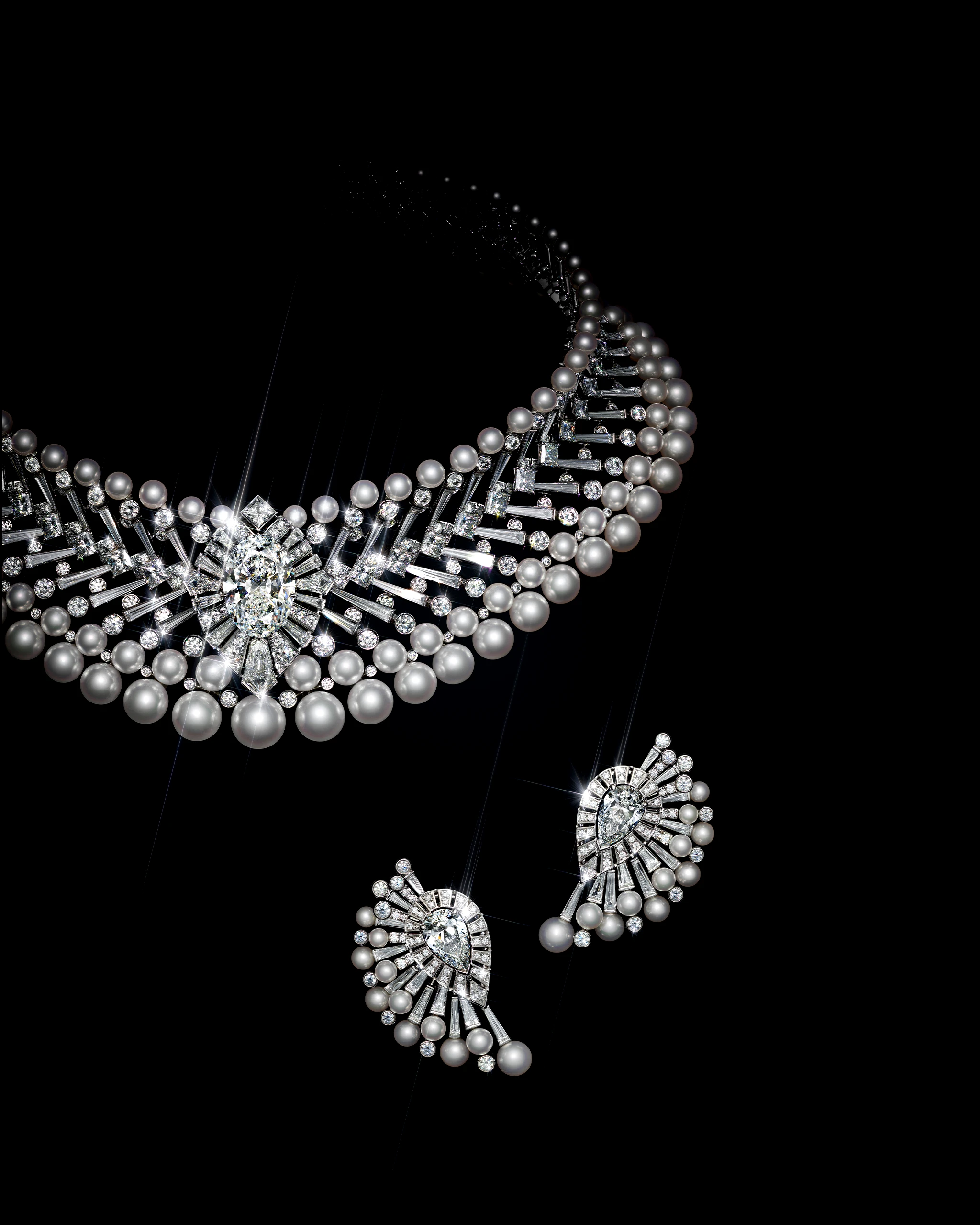 Luxurious diamond and pearl necklace draped in a curved arc against a black background.